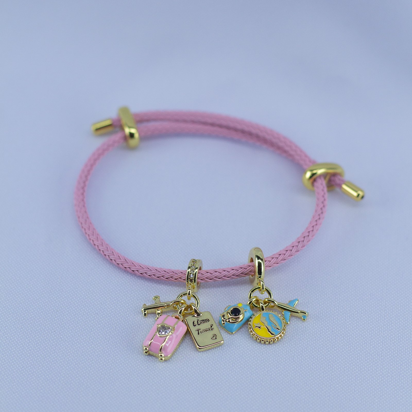 Dream Travel Charm Bracelet – Pink Cord with Suitcase & Adventure Charms - Image 2