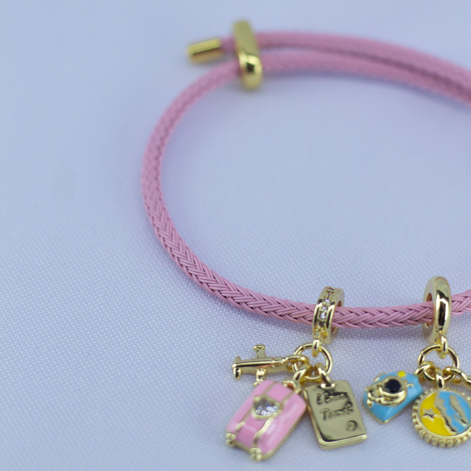 Dream Travel Charm Bracelet – Pink Cord with Suitcase & Adventure Charms - Image 3