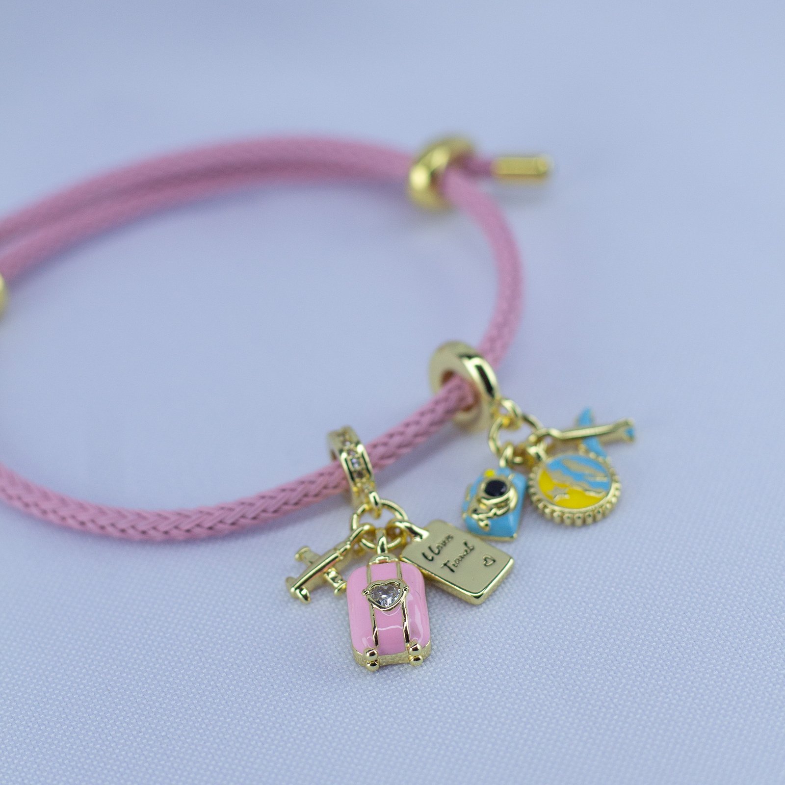 Dream Travel Charm Bracelet – Pink Cord with Suitcase & Adventure Charms - Image 4